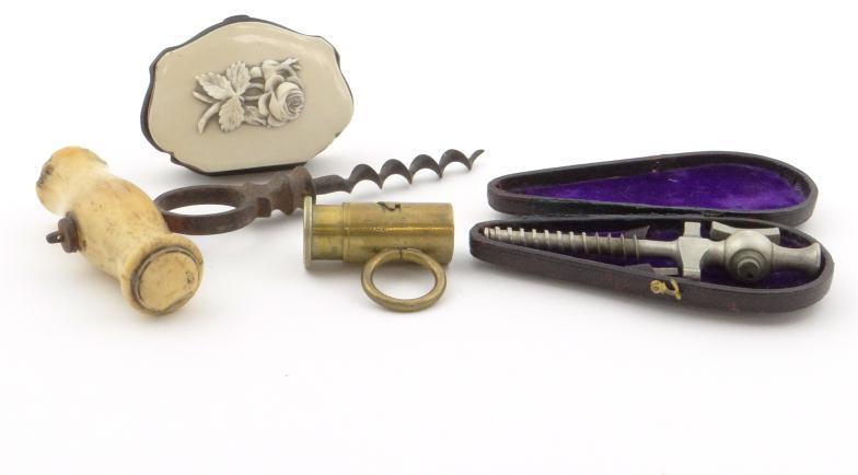 19th Century bone handled corkscrew, an Edwardian purse, brass shot measure and a cased soda water