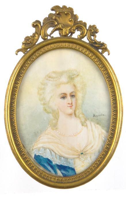 Oval portrait miniature of a female, signed Augusta and housed in an ornate brass frame, the
