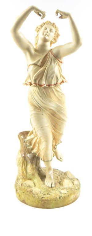 Large Royal Worcester blush ivory glazed figurine with hand painted and gilded decoration, factory