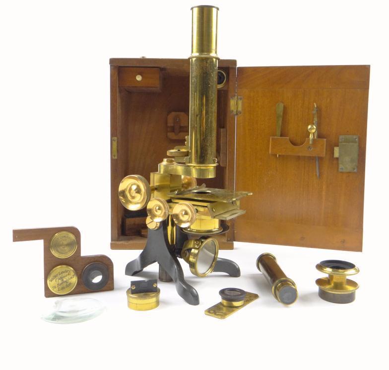 Walter Lawley brass microscope, together with a collection of lenses and accessories, housed in a