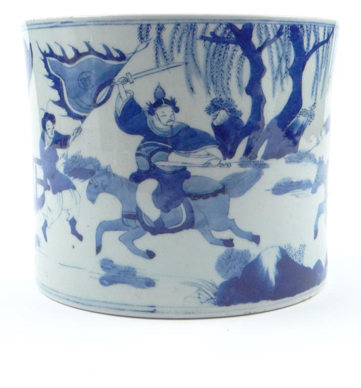 Chinese cylindrical porcelain brush pot decorated in underglaze blue with a continuous view of