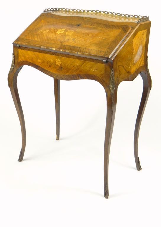 French quarter veneered rosewood bureau de dame with floral marquetry inlay, the brass gallery above