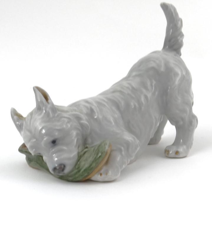 Royal Copenhagen china dog with a shoe : For Condition Reports Please visit www.eastbourneauction.