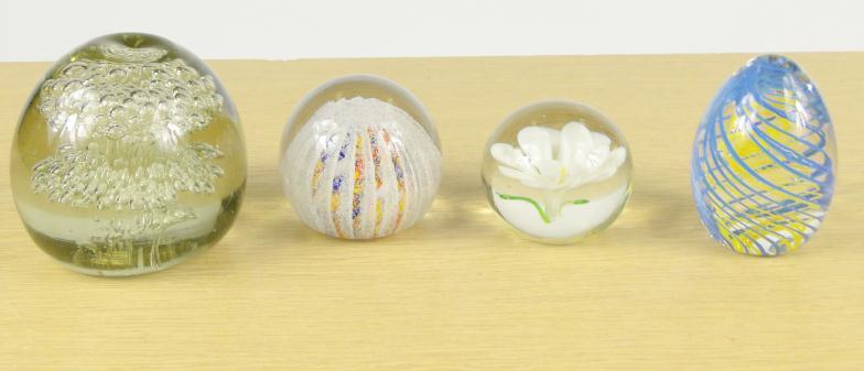 Four colourful glass paperweights : For Condition Reports Please visit www.eastbourneauction.com