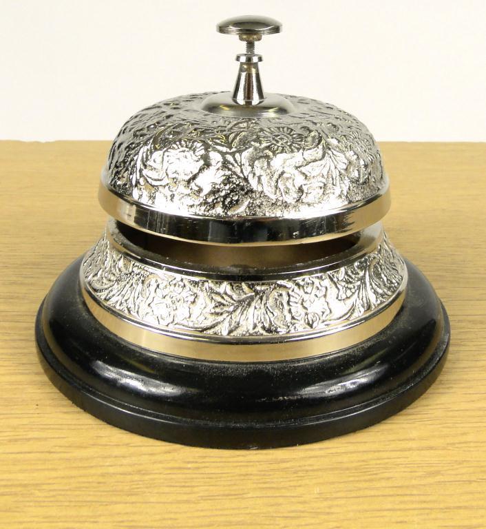 Silver coloured table bell : For Condition Reports Please visit www.eastbourneauction.com