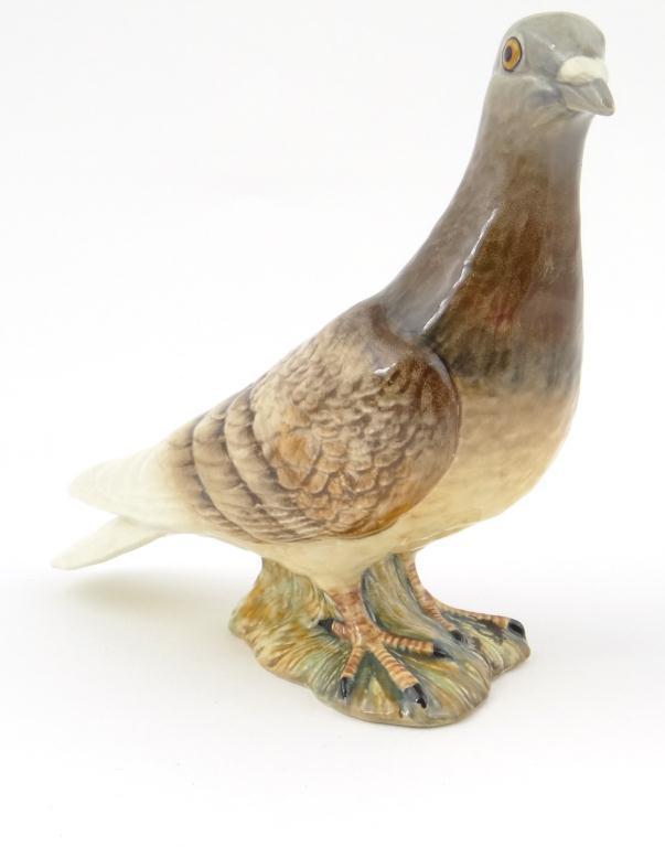 Beswick china pigeon : For Condition Reports Please visit www.eastbourneauction.com