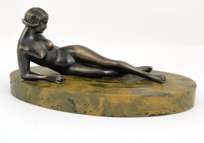 Bronzed study of a reclining nude female : For Condition Reports Please visit www.