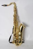 An Emdan Locto Tenor Saxophone complete in the original travel case