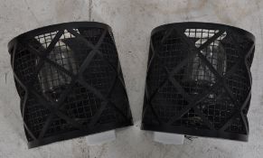 A pair of large industrial Coughtrie Glasgow wrought metal Industrial cage lights having huge
