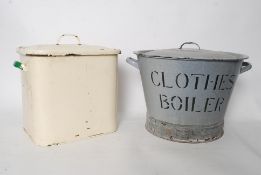 A 1950's cream and green biscuit / cake enamel bin, along with a similar enamel 'Clothes Boiler' tin