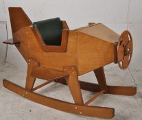 A good 20th century handmade large childs wooden rocking aeroplane. Sleigh runners with rexxine