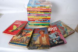 A collection of vintage childrens annuals to include Buffalo Bill, Jim'll Fix It, Top Of The Pops