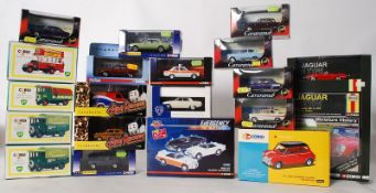 A collection of boxed diecast toy cars to include Cararama, Corgi BP, Corgi Drive Time, Vanguards,
