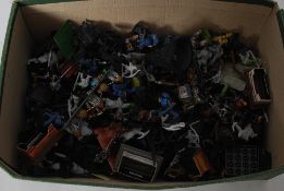 A large quantity of Warhammer statues / figures and some battle accessories