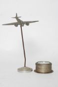 A 1940's desk top apprentice piece airplane constructed of metal. possibly a Mosquito fighter