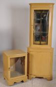 A shabby chic painted corner cabinet having glazed cabinet over cupboard along with a hi-fi cabinet