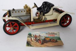 A vintage Mamod Steam car, in the Rolls Royce style, being white with real rubber tyres. Complete