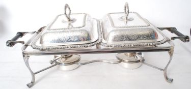 A Hukin & Heath silver plated twin burner food warmer and two rectangle lidded dishes with incised