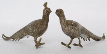 A set of silver plate birds - a cock and a pheasant