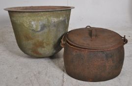 An Industrial cast metal copper / Ideal as a planter. Together with a large cast metal pan with