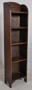 A 1930's Art Deco tall bookcase cabinet. 4 shelves having a stage gallery back. H120cm x W31cm x