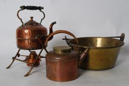A Victorian Arts & Crafts copper spirit kettle complete with burner and stand. Together with a brass