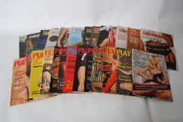 A collection of vintage adult magazines to include Playbirds and Club International. 26 in total