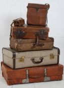 A good stack of vintage suitcases to include a good leather example and also a leather satchel etc (