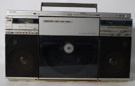 A vintage 1980's Sharp upright record player  / ghetto blaster