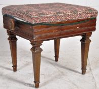 An Edwardian Brooks metamorphic piano stool, the adjustable upholstered seat having turned handles