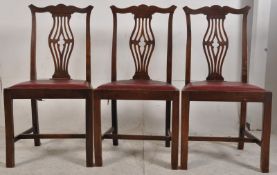 3 Edwardian mahogany Chippendale revival dining chairs. Squared legs united by stretchers having