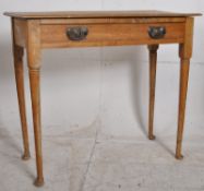 A Victorian country oak and elm side / hall / writing table. Raised over turned legs with pad feet