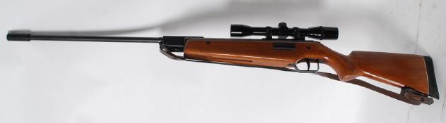 A Vintage `Original` Model 20 Air Rifle being fitted with atelescopic sight, Condition of sale: