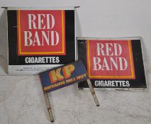 A vintage pair of 20th century enamel advertising signs for Red Band cigarettes together with a