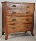 A Georgian solid mahogany 2 over 3 chest of drawers. Raised on french kick legs with 2 short over
