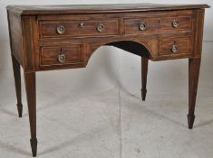 A 19th century Georgian mahogany writing desk. Raised on square tapered legs having fitted drawers