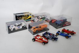 A collection of Scalextric racing cars to include Lister Storm, Lola, Porsche and vintage Formula