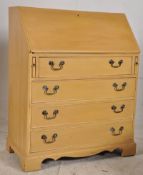 A shabby chic painted mahogany bureau. Three drawers uder fall front writing slope having lined