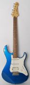 A Pacifica Yamaha electric guitar, stratocaster style, in lightening blue colour scheme, with