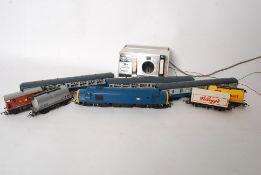A Hornby 00 gauge train set to include engine, carriages, rolling stock and track etc