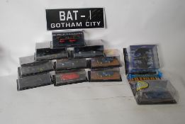 A collection of 11 Eagle Moss Batman diecast style model vehicles. Comprising vehicles from the