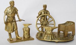 A vintage heavy brass smithing statue / figurine, along with another of a blacksmith