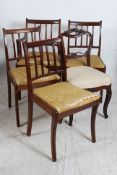 A set of 4 mahogany 20th century dining chairs together with a French mahogany balloon back