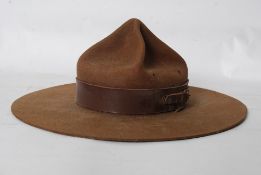 A vintage 20th century Scouts hat from Otow, Canada. Leather lined interior with notation complete