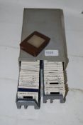 A collection of 1960's risque and nude model photographic slides. Two cases in total, and one