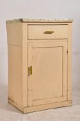 A painted shabby chic early 20th century pedestal kitchen cabinet having locker door with drawer