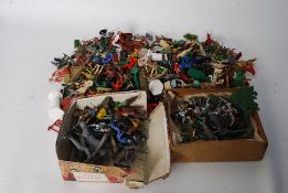 A collection of plastic figures by Crescent and Britains etc