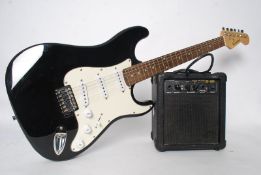 A Burwood electric stratocaster guitar along with a Burwood instrument amplifier, along with a St