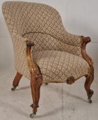 A 19th century Victorian mahogany framed armchair. Raised on cabriole legs with a serpentine