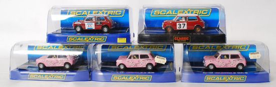 A collection of Scalextric cars, all Minis - each still new in the box - comprising 3x Pink Morris